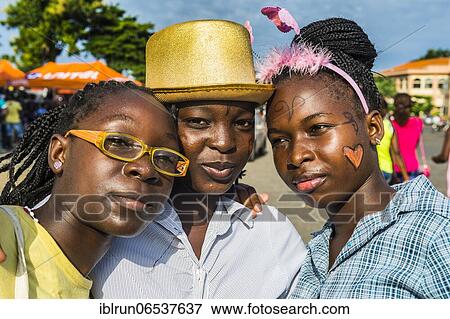Friendly girls at the Carneval in the town of Sao Tome, Sao Tome and Principe, Atlantic ocean, Africa View Large Photo Image Stock Photo - Friendly girls at the Carneval in the town of Sao Tome, Sao Tome and Principe, Atlantic ocean, Africa. Fotosearch