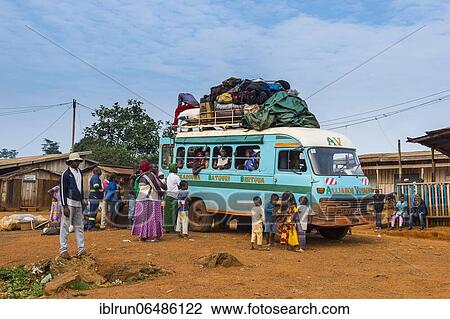 Stock Image - Fully loaded local bus in Libongo, deep in the jungle of Cameroon. Fotosearch