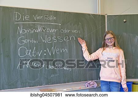 Girl at blackboard in German class, elementary school, Germany, Europe View Large Photo Image Stock Image - Girl at blackboard in German class, elementary school, Germany, Europe. Fotosearch