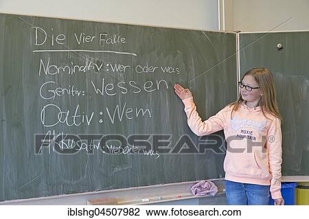 Girl at blackboard in German class, elementary school, Germany, Europe View Large Photo Image Stock Image - Girl at blackboard in German class, elementary school, Germany, Europe. Fotosearch