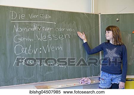 Girl at blackboard in German class, elementary school, Germany, Europe View Large Photo Image Stock Photography - Girl at blackboard in German class, elementary school, Germany, Europe. Fotosearch
