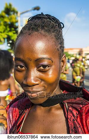 Picture - Girl posing at the Carneval in the town of Sao Tome, Sao Tome and Principe, Atlantic ocean, Africa. Fotosearch