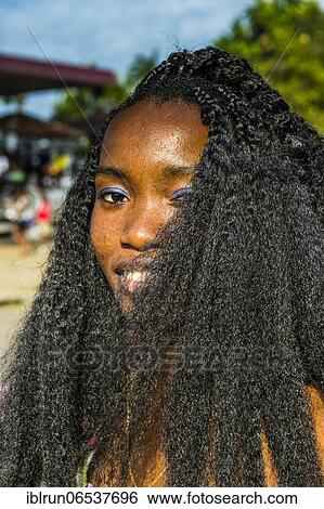 Girl posing at the Carneval in the town of Sao Tome, Sao Tome and Principe, Atlantic ocean, Africa View Large Photo Image Stock Photograph - Girl posing at the Carneval in the town of Sao Tome, Sao Tome and Principe, Atlantic ocean, Africa. Fotosearch