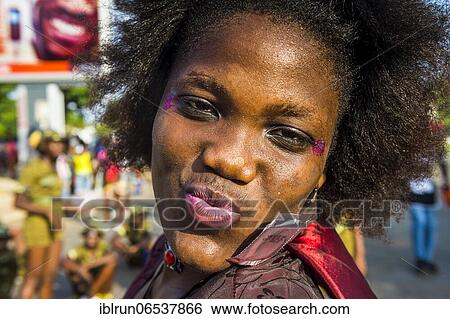 Stock Photograph - Girl posing at the Carneval in the town of Sao Tome, Sao Tome and Principe, Atlantic ocean, Africa. Fotosearch