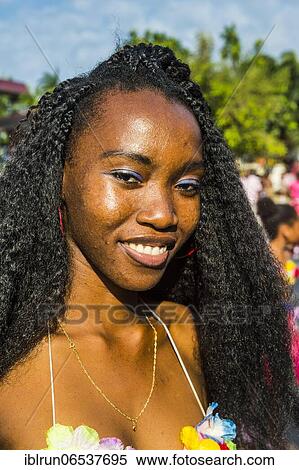 Stock Photography - Girl posing at the Carneval in the town of Sao Tome, Sao Tome and Principe, Atlantic ocean, Africa. Fotosearch