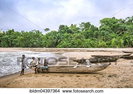 Girls, children in a dugout canoe on the beach, Ebodjé, Southern Region, Cameroon, Africa View Large Photo Image Picture - Girls, children in a dugout canoe on the beach, Ebodjé, Southern Region, Cameroon, Africa. Fotosearch