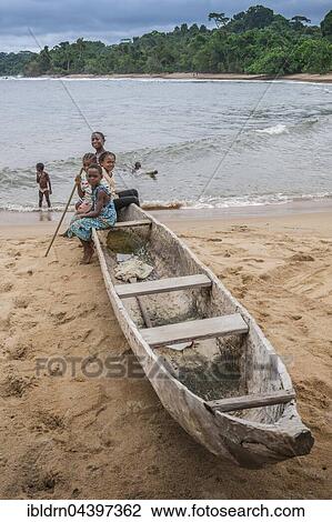Girls, children in a dugout canoe on the beach, Ebodjé, Southern Region, Cameroon, Africa View Large Photo Image Stock Image - Girls, children in a dugout canoe on the beach, Ebodjé, Southern Region, Cameroon, Africa. Fotosearch