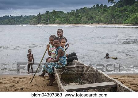 Girls, children in a dugout canoe on the beach, Ebodjé, Southern Region, Cameroon, Africa View Large Photo Image Stock Image - Girls, children in a dugout canoe on the beach, Ebodjé, Southern Region, Cameroon, Africa. Fotosearch