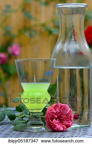 Stock Photo - Glass of Absinthe with water carafe, Green Fairy. Fotosearch