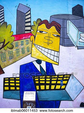 Graffiti Doin It Cool For The Eastside, theme real estate man with dollar sign and skyscraper, artist Jim Avignon and friends, mural at the East Side Gallery, Friedrichshain, Berlin, Germany, Europe View Large Photo Image Stock Image - Graffiti Doin It Cool For The Eastside, theme real estate man with dollar sign and skyscraper, artist Jim Avignon and friends, mural at the East Side Gallery, Friedrichshain, Berlin, Germany, Europe. Fotosearch