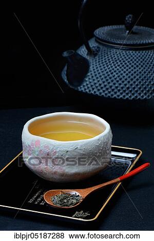 Stock Photo - Green tea in bowl, Sencha tea. Fotosearch