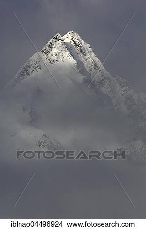 Grossglockner summit with clouds, High Tauern National Park, Carinthia, Austria, Europe View Large Photo Image Picture - Grossglockner summit with clouds, High Tauern National Park, Carinthia, Austria, Europe. Fotosearch