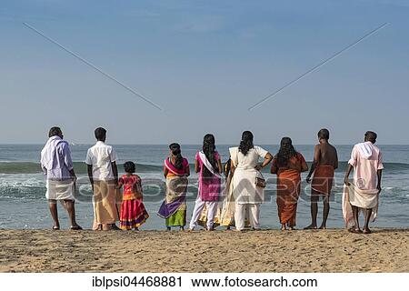 Group of Indian people in front of sea, Varkala Papanasham Beach, Kerala, India, Asia View Large Photo Image Stock Image - Group of Indian people in front of sea, Varkala Papanasham Beach, Kerala, India, Asia. Fotosearch