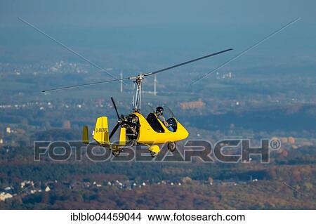 Gyrocopter D-MCMD, microlight, near Witten, Ruhr district, North Rhine-Westphalia, Germany, Europe View Large Photo Image Picture - Gyrocopter D-MCMD, microlight, near Witten, Ruhr district, North Rhine-Westphalia, Germany, Europe. Fotosearch