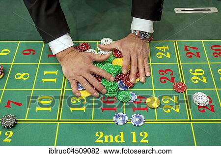 Hand collecting chips, roulette, Düsseldorf, North Rhine-Westphalia, Germany, Europe View Large Photo Image Stock Image - Hand collecting chips, roulette, Düsseldorf, North Rhine-Westphalia, Germany, Europe. Fotosearch