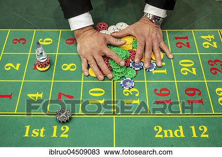 Hand collecting chips, roulette, Düsseldorf, North Rhine-Westphalia, Germany, Europe View Large Photo Image Stock Image - Hand collecting chips, roulette, Düsseldorf, North Rhine-Westphalia, Germany, Europe. Fotosearch