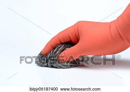 Hand with steel chips, steel shavings, steel wool, remove dirt, household glove, polish, derust View Large Photo Image Stock Image - Hand with steel chips, steel shavings, steel wool, remove dirt, household glove, polish, derust. Fotosearch