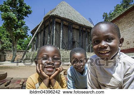 Happy children in front of meeting room, Atchum, Fon's Palace, Bafut, Bamenda, North-West Region, Cameroon, Africa View Large Photo Image Stock Image - Happy children in front of meeting room, Atchum, Fon's Palace, Bafut, Bamenda, North-West Region, Cameroon, Africa. Fotosearch