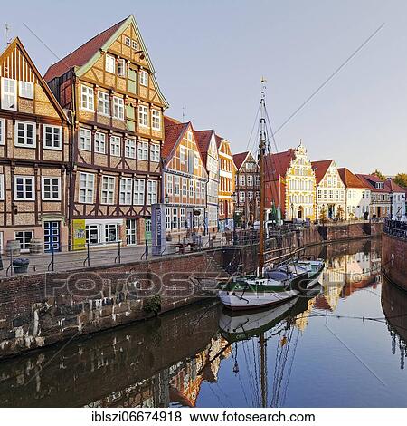 Historic merchant and warehouse houses at the Hanseatic port with the sailing ship Willi, Old Town, Stade, Lower Saxony, Germany, Europe View Large Photo Image Stock Photo - Historic merchant and warehouse houses at the Hanseatic port with the sailing ship Willi, Old Town, Stade, Lower Saxony, Germany, Europe. Fotosearch