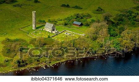 Stock Photograph - Holy Island with dilapidated monastery, Lough Derg Lake, River Shannon, County Clare, Ireland, Europe. Fotosearch