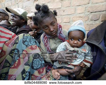 Homeless teenagers with baby on the street, Fianarantsoa province, Madagascar, Africa View Large Photo Image Stock Image - Homeless teenagers with baby on the street, Fianarantsoa province, Madagascar, Africa. Fotosearch