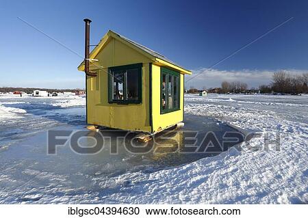 Ice fishing cabin on frozen Saint Lawrence River, Maple Grove, Quebec, Canada, North America View Large Photo Image Stock Image - Ice fishing cabin on frozen Saint Lawrence River, Maple Grove, Quebec, Canada, North America. Fotosearch