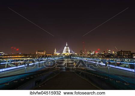Stock Image - Illuminated Millennium Bridge and St. Paul's Cathedral, night shot, London, London, England, United Kingdom, Europe. Fotosearch