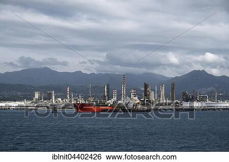 Stock Photograph - Industrial area by the harbor, Milazzo, Sicily, Italy, Europe. Fotosearch