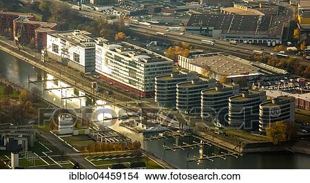 Inner harbor in the evening light, office building Five Boats in front of Landesarchiv North Rhine-Westphalia, Rhineland, Duisburg, Ruhr district, North Rhine-Westphalia, Germany, Europe View Large Photo Image Picture - Inner harbor in the evening light, office building Five Boats in front of Landesarchiv North Rhine-Westphalia, Rhineland, Duisburg, Ruhr district, North Rhine-Westphalia, Germany, Europe. Fotosearch