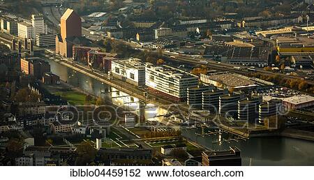 Inner harbor in the evening light, office building Five Boats in front of Landesarchiv North Rhine-Westphalia, Rhineland, Duisburg, Ruhr district, North Rhine-Westphalia, Germany, Europe View Large Photo Image Stock Image - Inner harbor in the evening light, office building Five Boats in front of Landesarchiv North Rhine-Westphalia, Rhineland, Duisburg, Ruhr district, North Rhine-Westphalia, Germany, Europe. Fotosearch