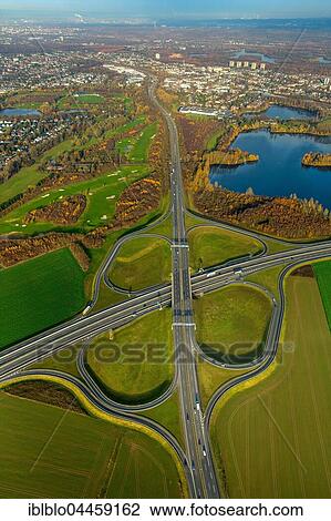Stock Image - Interchange Kreuz Duisburg-Süd, shamrock, A59 and federal road B288, Duisburg, Ruhr district, North Rhine-Westphalia, Germany, Europe. Fotosearch