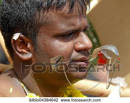 Kavadi dancers with pierced cheeks, Sri Kamadchi-Ampal Temple Festival, Hindu temple festival, Hamm, Ruhr district, North Rhine-Westphalia, Germany, Europe View Large Photo Image Stock Image - Kavadi dancers with pierced cheeks, Sri Kamadchi-Ampal Temple Festival, Hindu temple festival, Hamm, Ruhr district, North Rhine-Westphalia, Germany, Europe. Fotosearch
