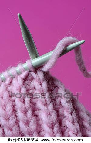 Knitted wool with knitting needles, wool, felting wool, do-it-yourself, knitting View Large Photo Image Picture - Knitted wool with knitting needles, wool, felting wool, do-it-yourself, knitting. Fotosearch