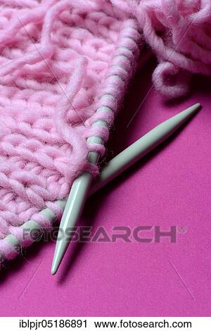 Knitted wool with knitting needles, wool, felting wool, do-it-yourself, knitting View Large Photo Image Stock Image - Knitted wool with knitting needles, wool, felting wool, do-it-yourself, knitting. Fotosearch