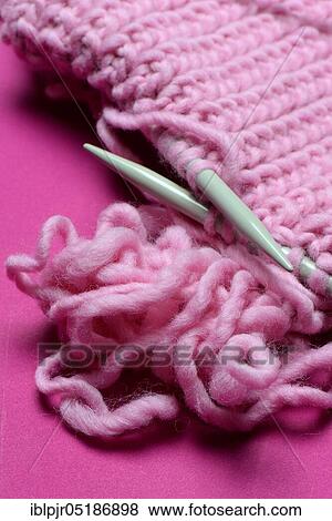 Knitted wool with knitting needles, wool, felting wool, do-it-yourself, knitting View Large Photo Image Stock Photo - Knitted wool with knitting needles, wool, felting wool, do-it-yourself, knitting. Fotosearch