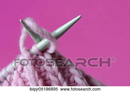 Knitted wool with knitting needles, wool, felting wool, do-it-yourself, knitting View Large Photo Image Stock Photography - Knitted wool with knitting needles, wool, felting wool, do-it-yourself, knitting. Fotosearch