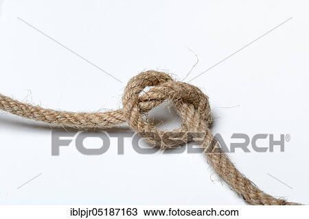 Stock Image - Knots in jute rope, intertwined, knotted. Fotosearch