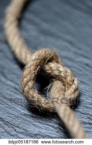 Knots in jute rope, intertwined, knotted View Large Photo Image Stock Photograph - Knots in jute rope, intertwined, knotted. Fotosearch