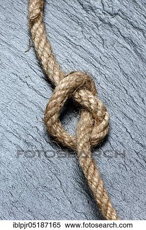 Knots in jute rope, intertwined, knotted View Large Photo Image Stock Photography - Knots in jute rope, intertwined, knotted. Fotosearch