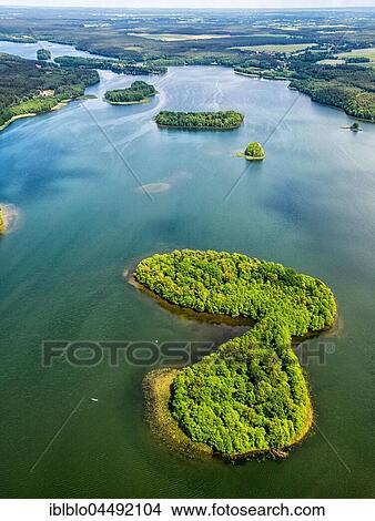Lake scenery, Pomeranian Lake District, wooded island, Lesnice, Western Pomerania Province, Poland, Europe View Large Photo Image Picture - Lake scenery, Pomeranian Lake District, wooded island, Lesnice, Western Pomerania Province, Poland, Europe. Fotosearch