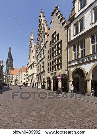 Stock Image - Lamberti-Church, city wine house and townhall at Prinzipalmarkt, Münster, Münsterland, North Rhine-Westphalia, Germany, Europe. Fotosearch