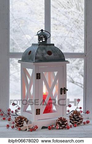 Lantern with Christmas decoration on windowsill View Large Photo Image Stock Image - Lantern with Christmas decoration on windowsill. Fotosearch