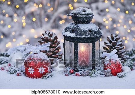 Stock Image - Lantern with outdoor Christmas decoration. Fotosearch