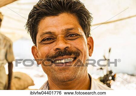 Laughing shopkeeper in a market, Chinnamanur, Tamil Nadu, India, Asia View Large Photo Image Stock Photograph - Laughing shopkeeper in a market, Chinnamanur, Tamil Nadu, India, Asia. Fotosearch
