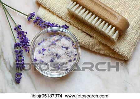 Picture - Lavender salt, sea salt with lavender flowers in a bowl, bath additive. Fotosearch