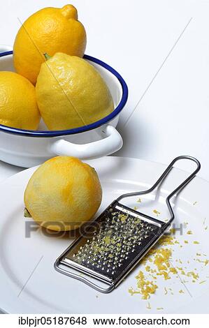 Lemon, lemon grated with grater, lemon peel, lemon rind, lemon grated, lemon zest, lemon zest, grated peel, landscape format, grater View Large Photo Image Stock Photo - Lemon, lemon grated with grater, lemon peel, lemon rind, lemon grated, lemon zest, lemon zest, grated peel, landscape format, grater. Fotosearch
