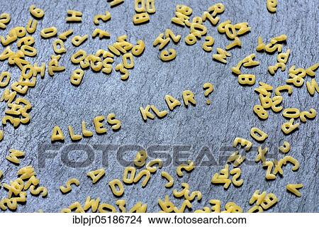 Picture - Letter noodles make word, all right?. Fotosearch