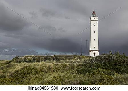 Lighthouse against stormy sky, Blavandshuk near Blavand, Jutland, Denmark, Europe View Large Photo Image Stock Image - Lighthouse against stormy sky, Blavandshuk near Blavand, Jutland, Denmark, Europe. Fotosearch