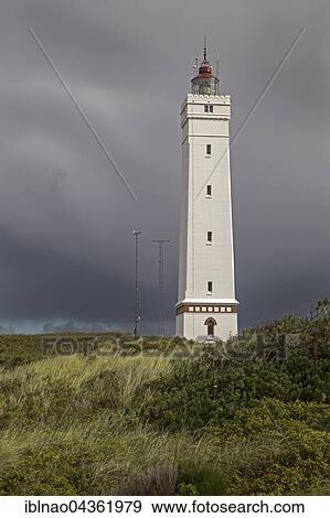 Lighthouse against stormy sky, Blavandshuk near Blavand, Jutland, Denmark, Europe View Large Photo Image Stock Photo - Lighthouse against stormy sky, Blavandshuk near Blavand, Jutland, Denmark, Europe. Fotosearch