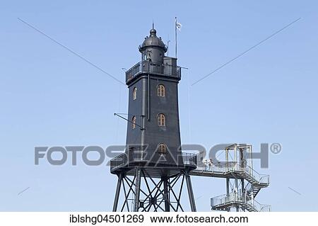 Stock Photo - Lighthouse, Dorum, Wurster country, Lower Saxony, Germany, Europe. Fotosearch